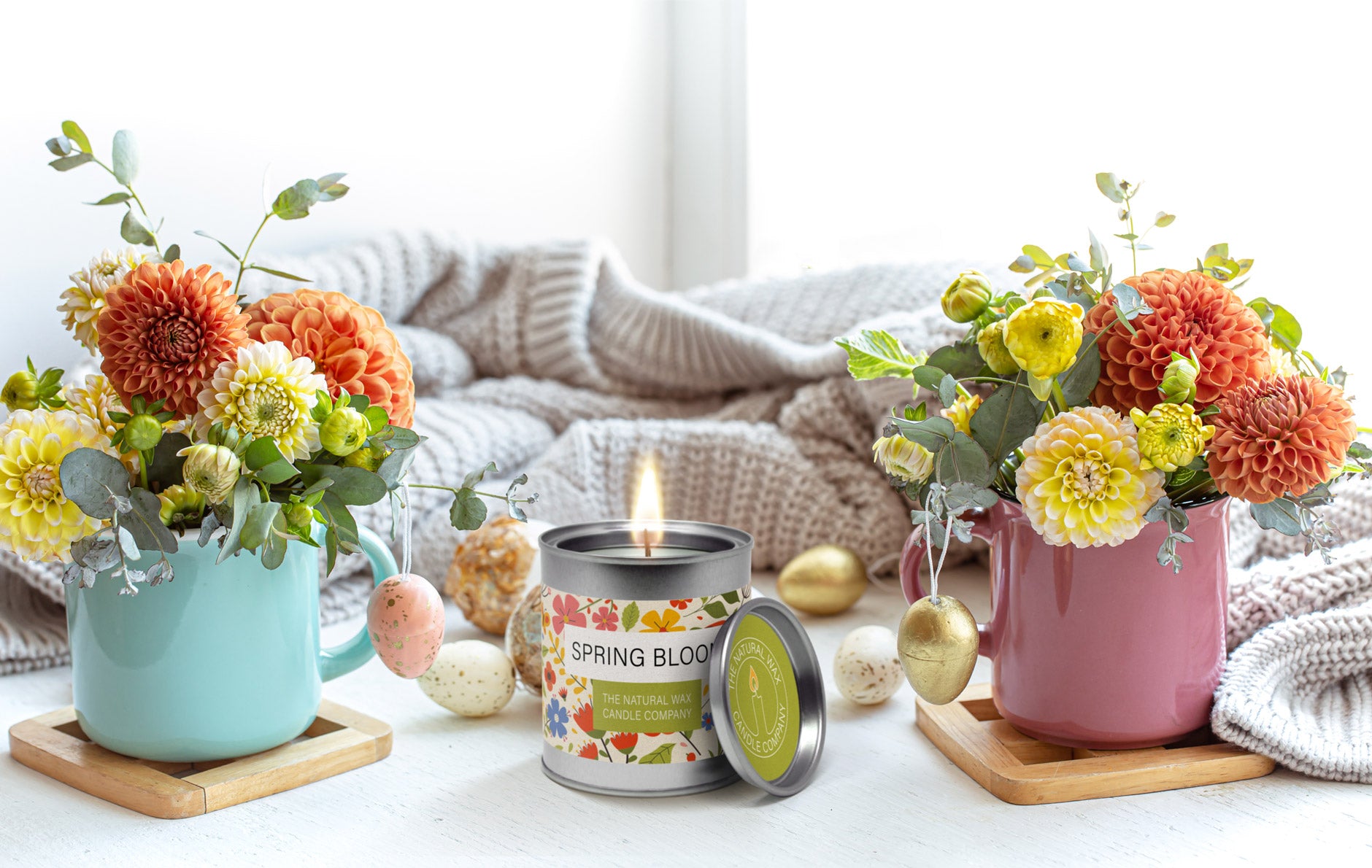 Candle tin packaging with easter and mother's day themed background.